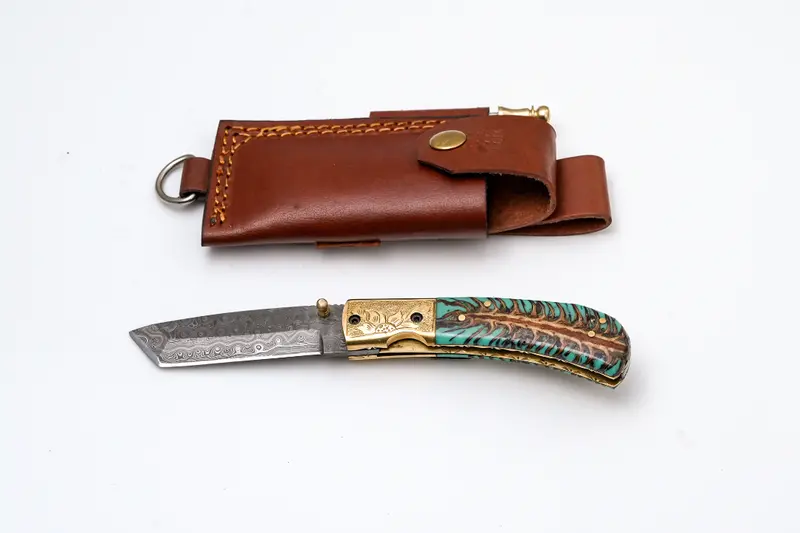 Tanto-Profile Damascus Folder With Teal Pine Cone Handle, Engraved Bolster, And Integrated Fire Starter – Tf-072 1
